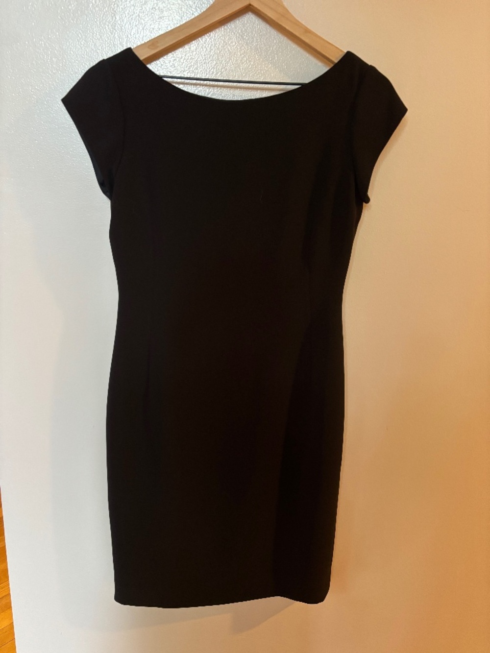 Emanuel Ungaro Black cap sleeve deep back “V” dress.